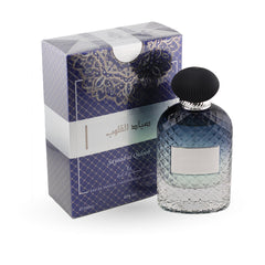 Perfume bottle and packaging with decorative design on a white background