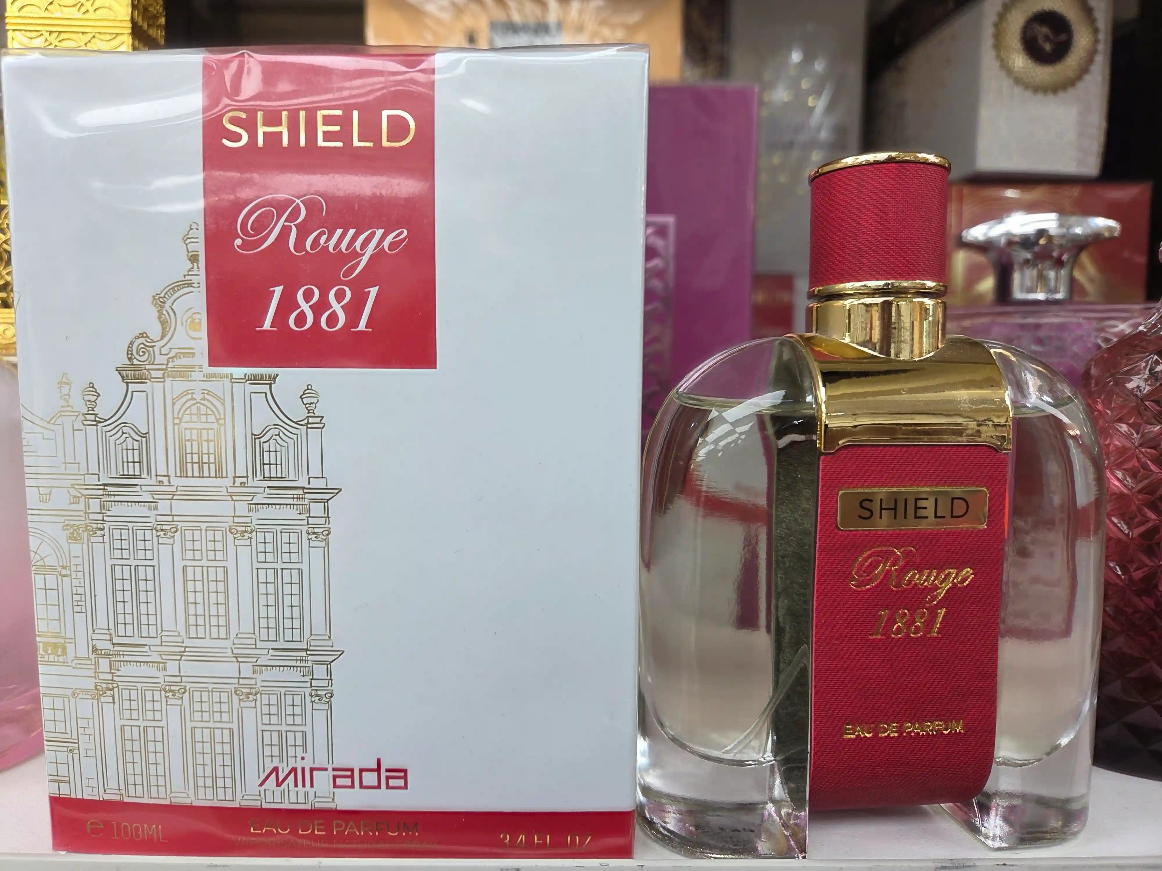 Shield Rouge 1881 Mirada 100ml unisex perfume with red strap design