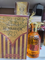 Sultan Al Hareem 100ml amber perfume bottle with ornate packaging