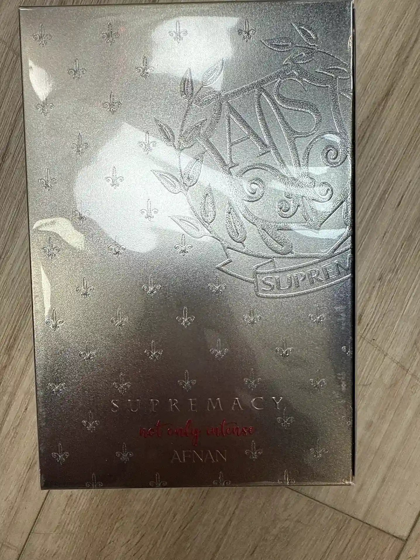 Supremacy luxury perfume by Afnan in silver embossed packaging