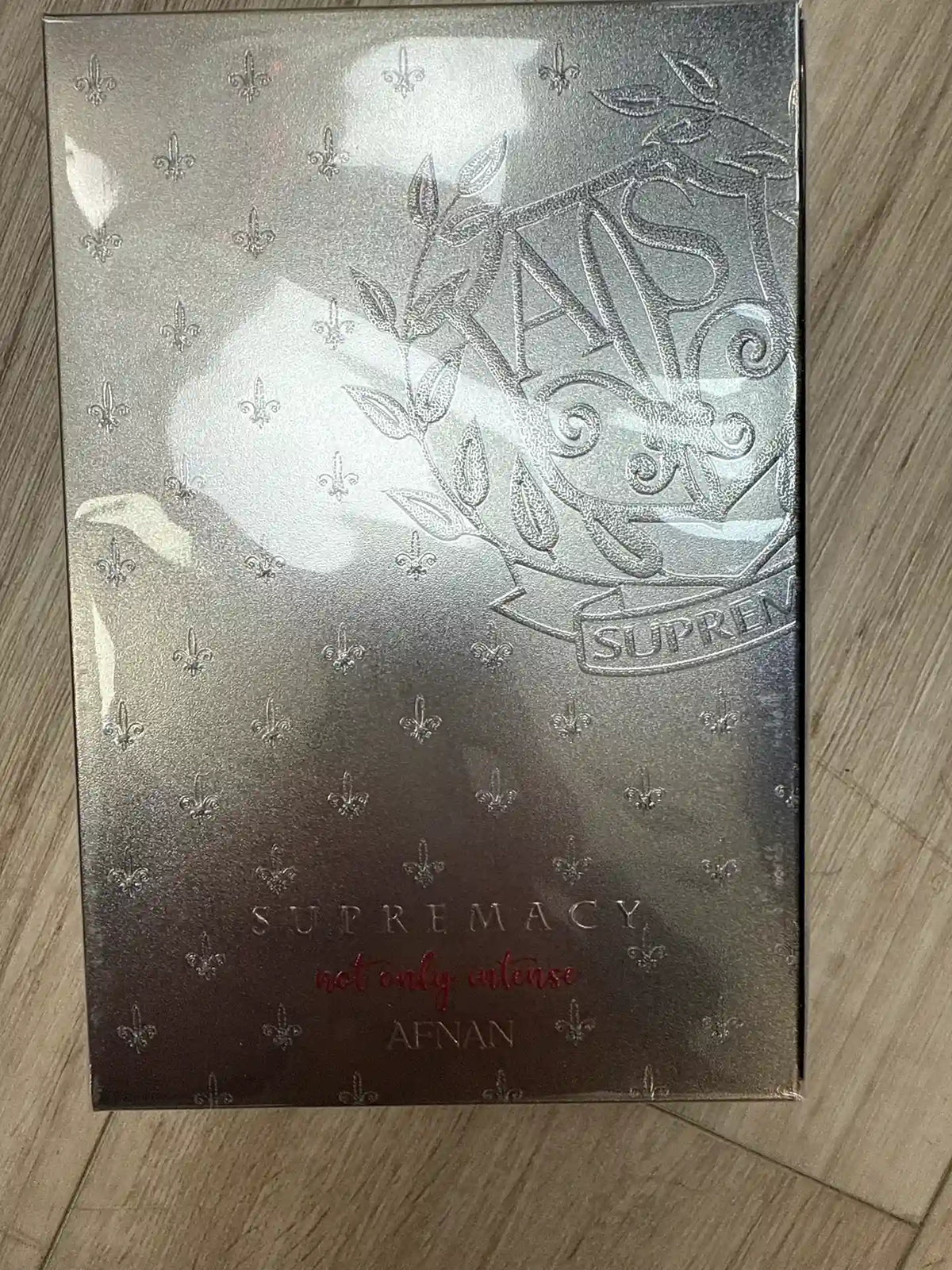 Supremacy luxury perfume by Afnan in silver embossed packaging