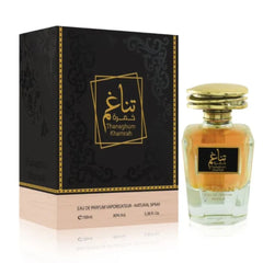 Tanaghum Khamrah amber perfume bottle with black gold Arabic packaging