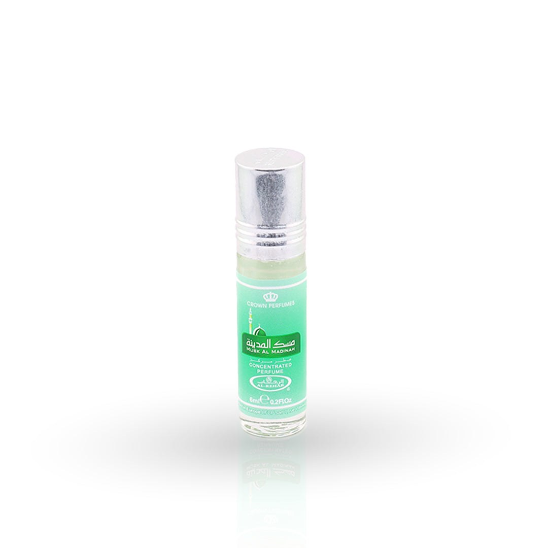 Roll-on perfume bottle with green label on a white background