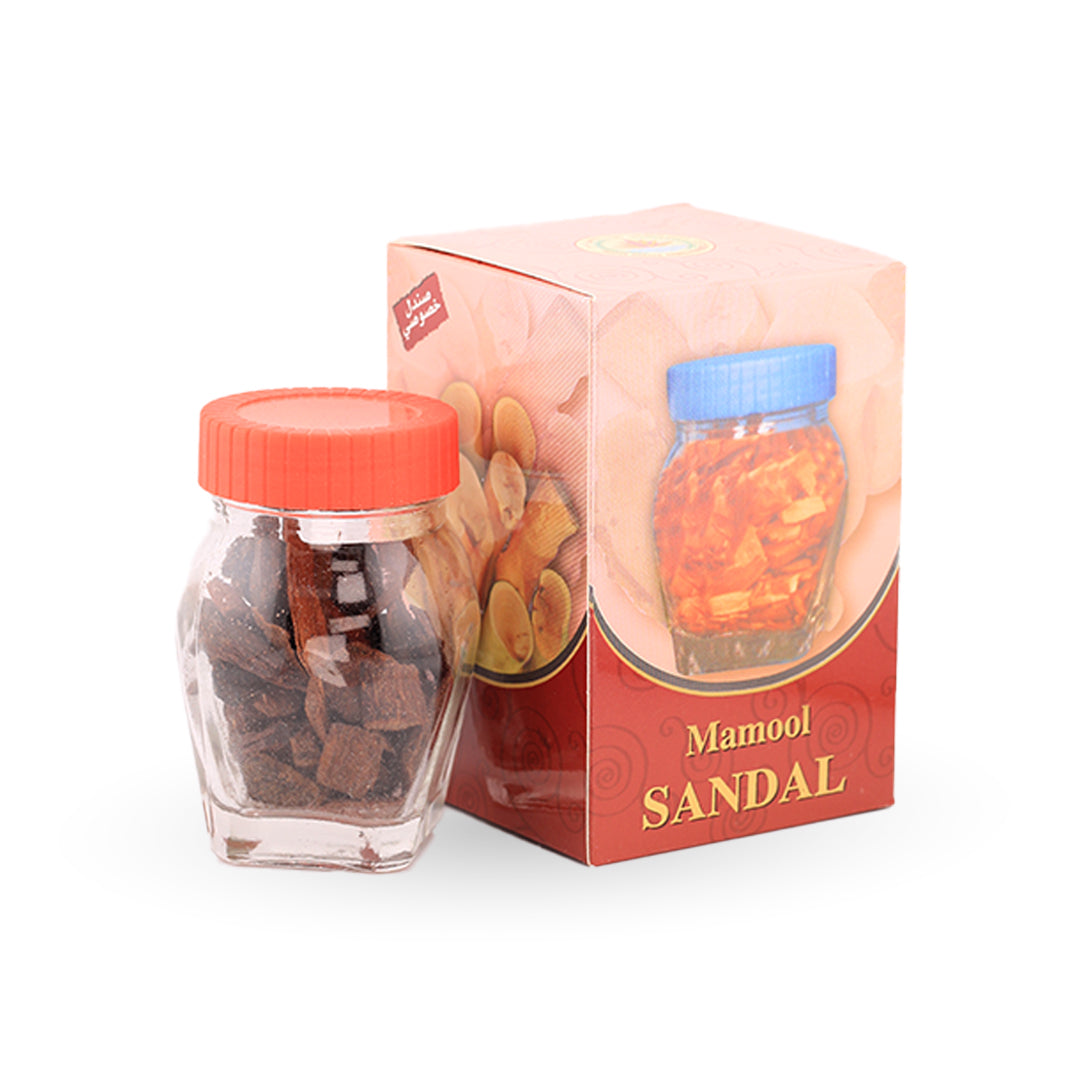 Glass jar with red lid and packaging box labeled 'Mamool Sandal' on a white background