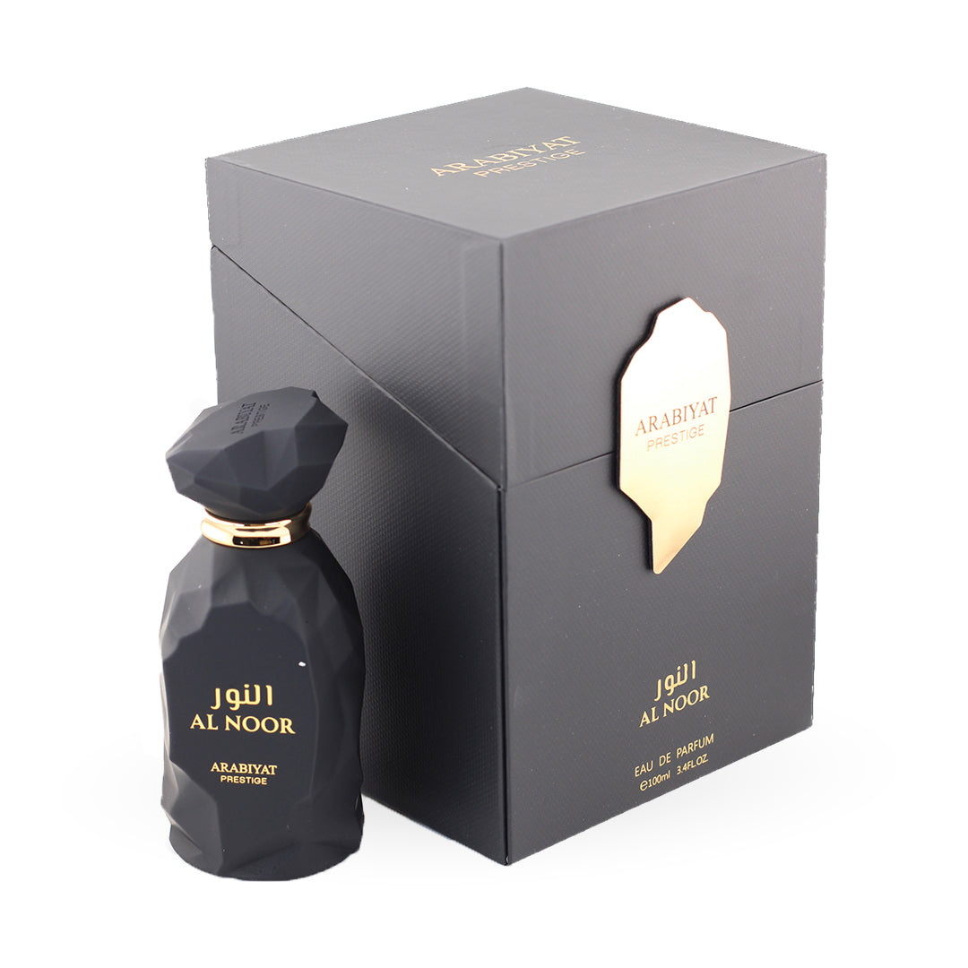 Black perfume bottle and packaging with 'Al Noor' branding on a white background