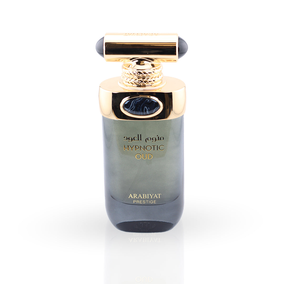 Perfume bottle with gold cap and label on a white background