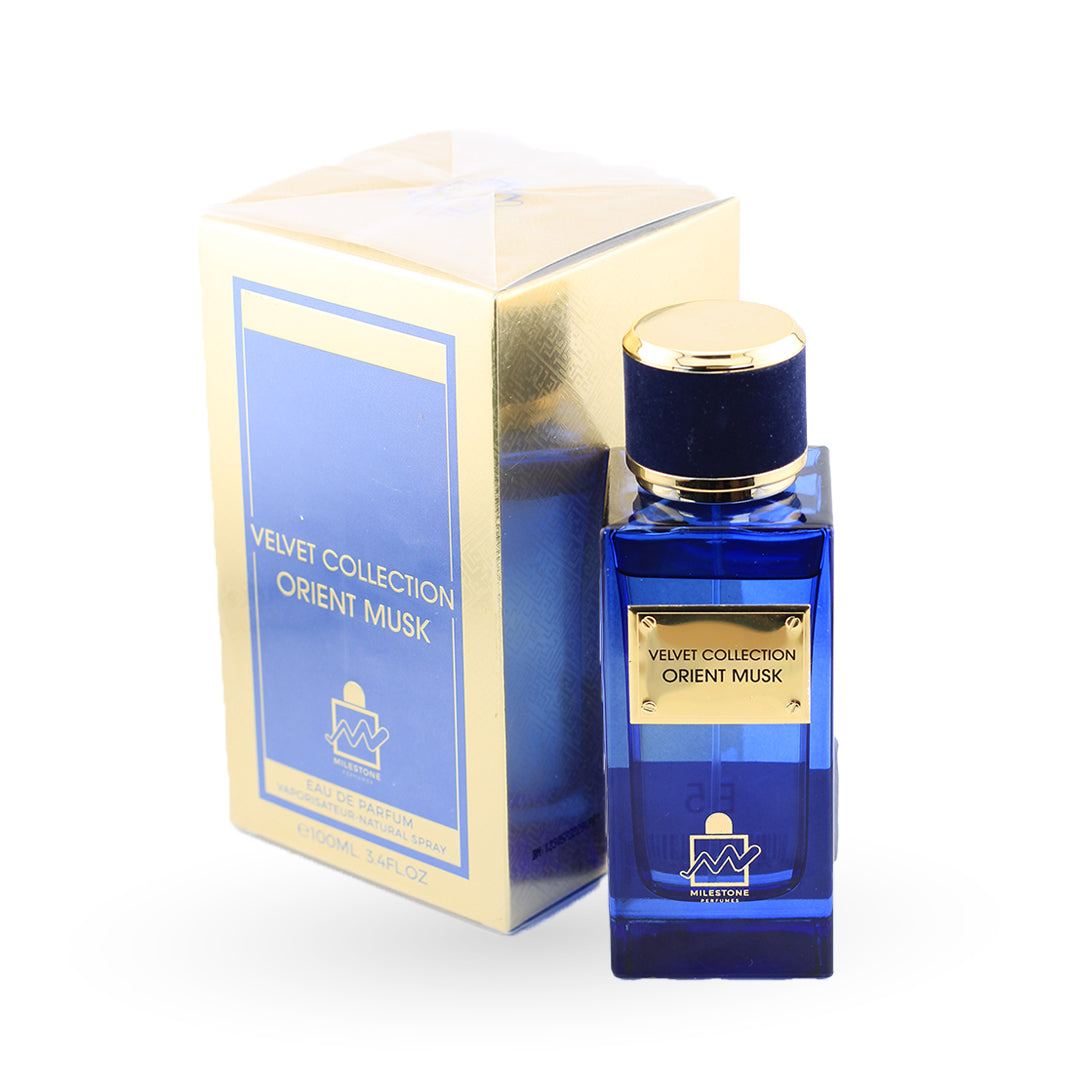 Blue perfume bottle with gold cap and 'Velvet Collection Orient Musk' packaging on a white background