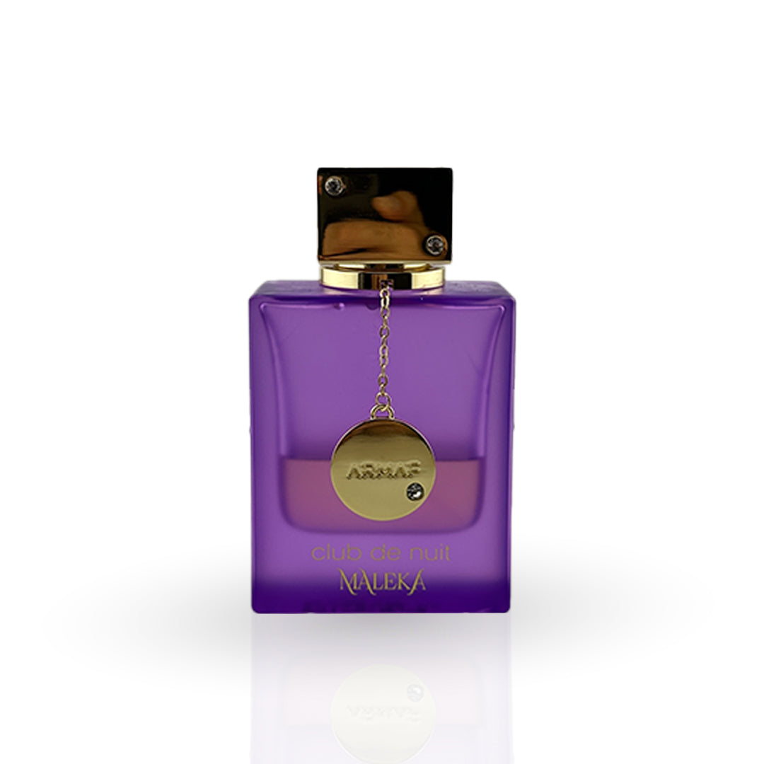 Purple perfume bottle with gold cap and label on a white background