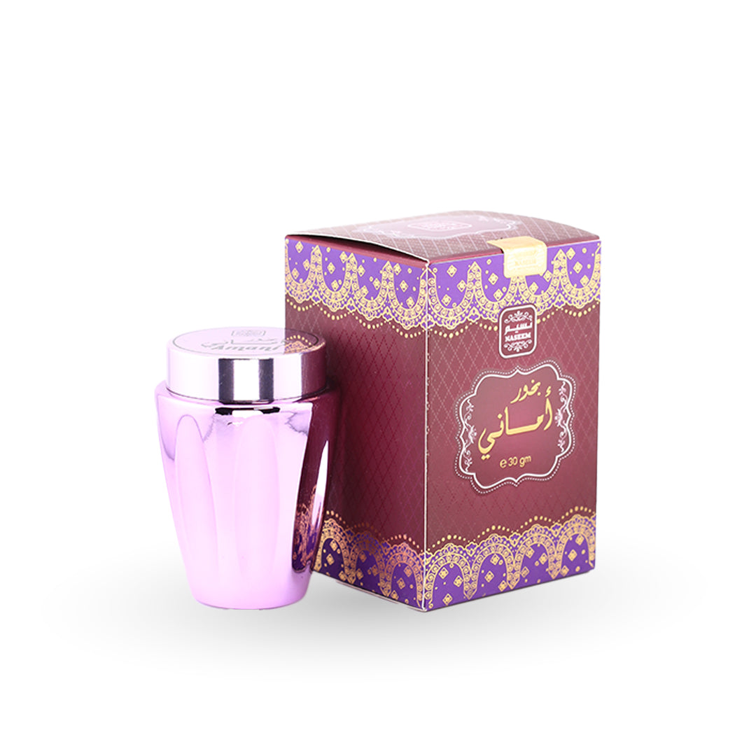 Purple container with silver lid next to its decorative box on a white background