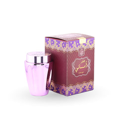 Purple container with silver lid next to its decorative box on a white background