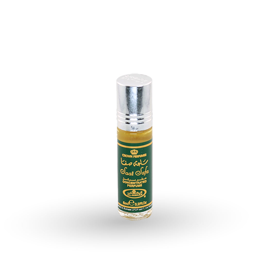 Perfume bottle with green label and silver cap on a white background