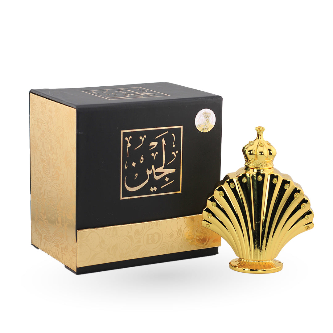 Gold and black perfume bottle with packaging on a white background