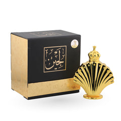 Gold and black perfume bottle with packaging on a white background