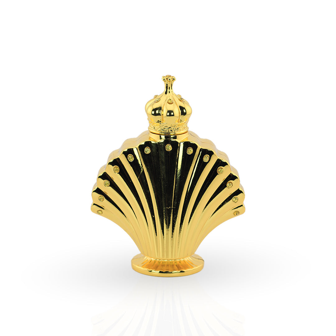Gold shell-shaped perfume bottle on a white background