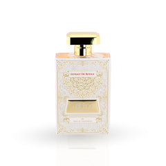 Perfume bottle with gold cap and decorative label on a white background