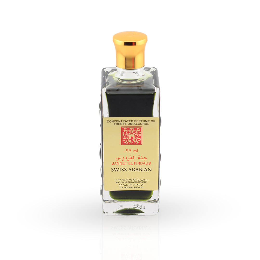 Swiss Arabian perfume bottle with gold cap on a white background