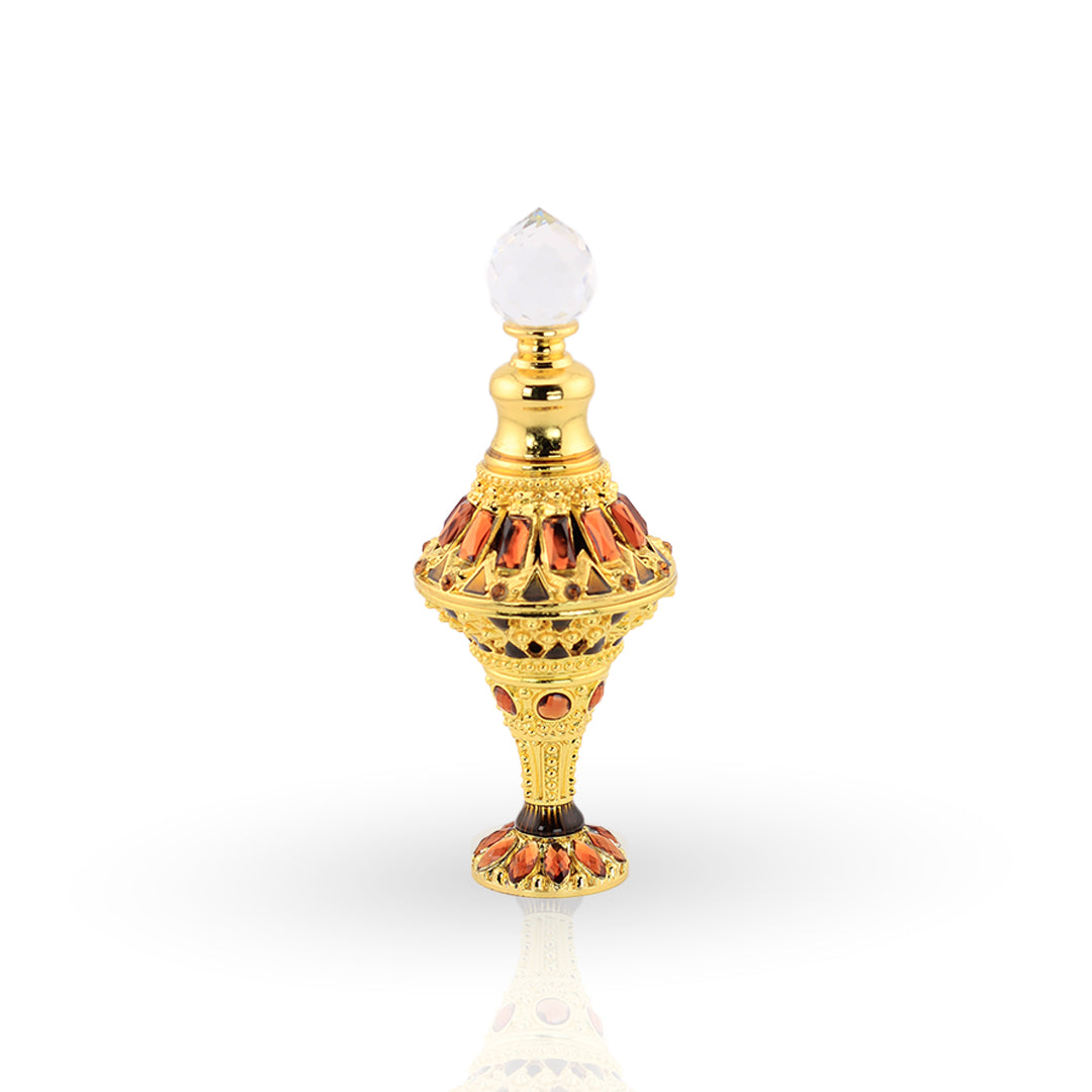 Decorative bottle with gold and red accents on a white background