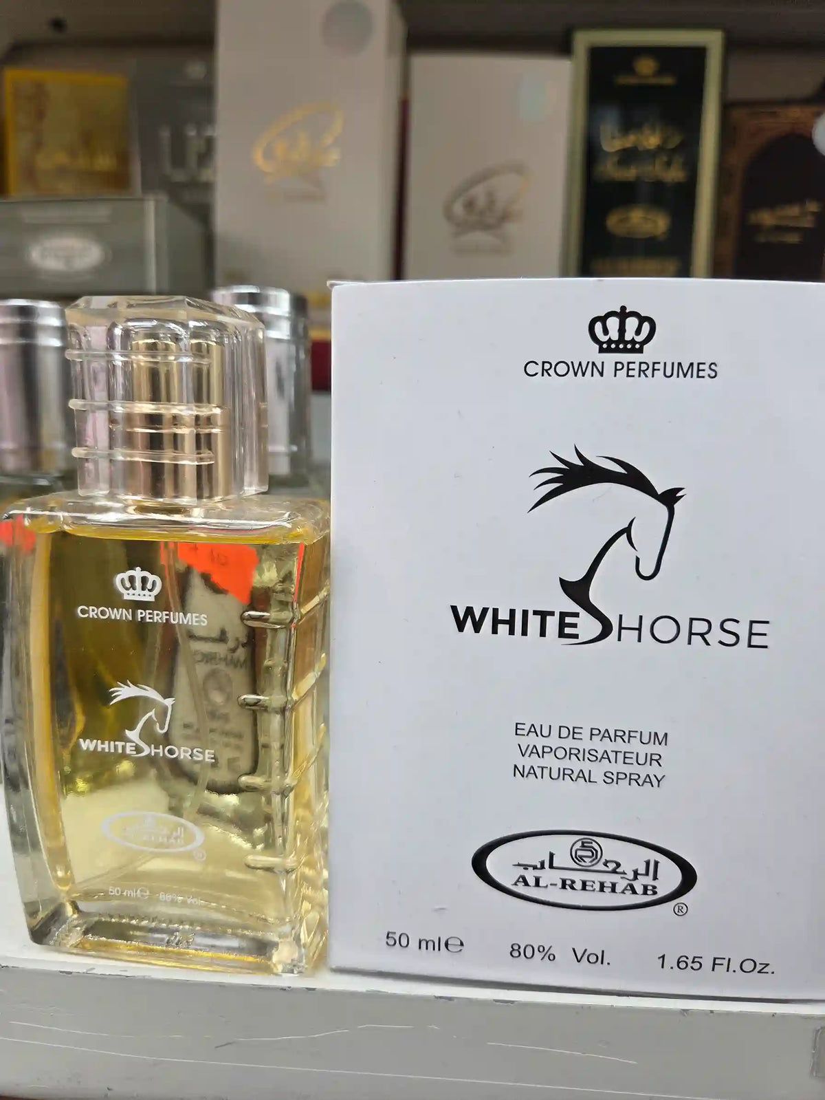 White Horse perfume 50ml clear bottle with white packaging by Crown Perfumes