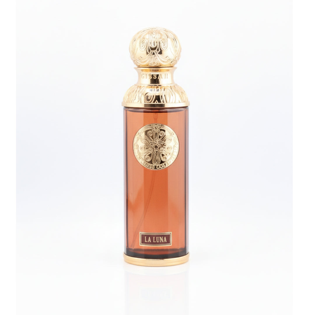 Perfume bottle with gold cap and 'La Luna' label on a white background