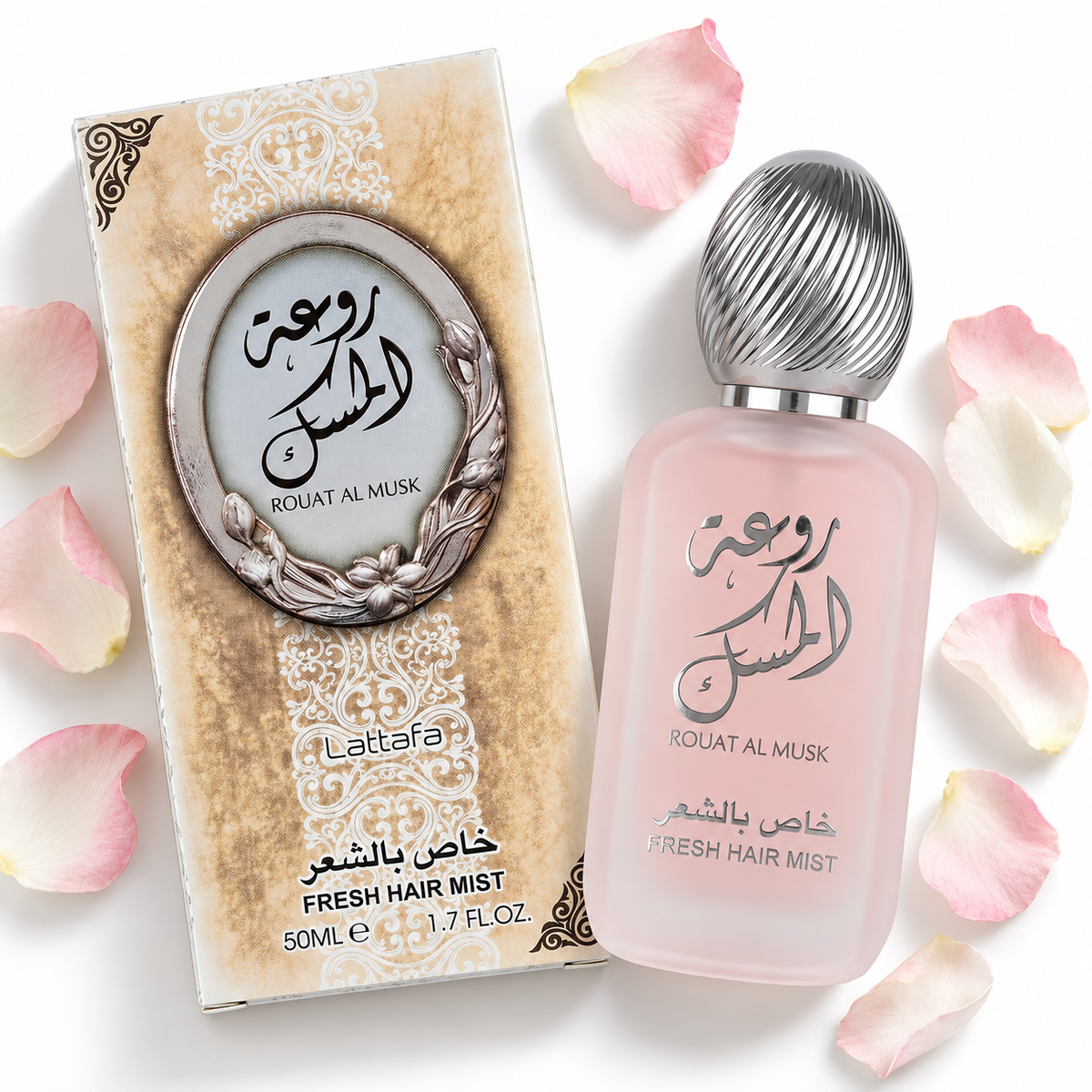 Lattafa Rouat Al Musk Fresh Hair Mist 50ml pink bottle and matching carton on white with pale flower petals.