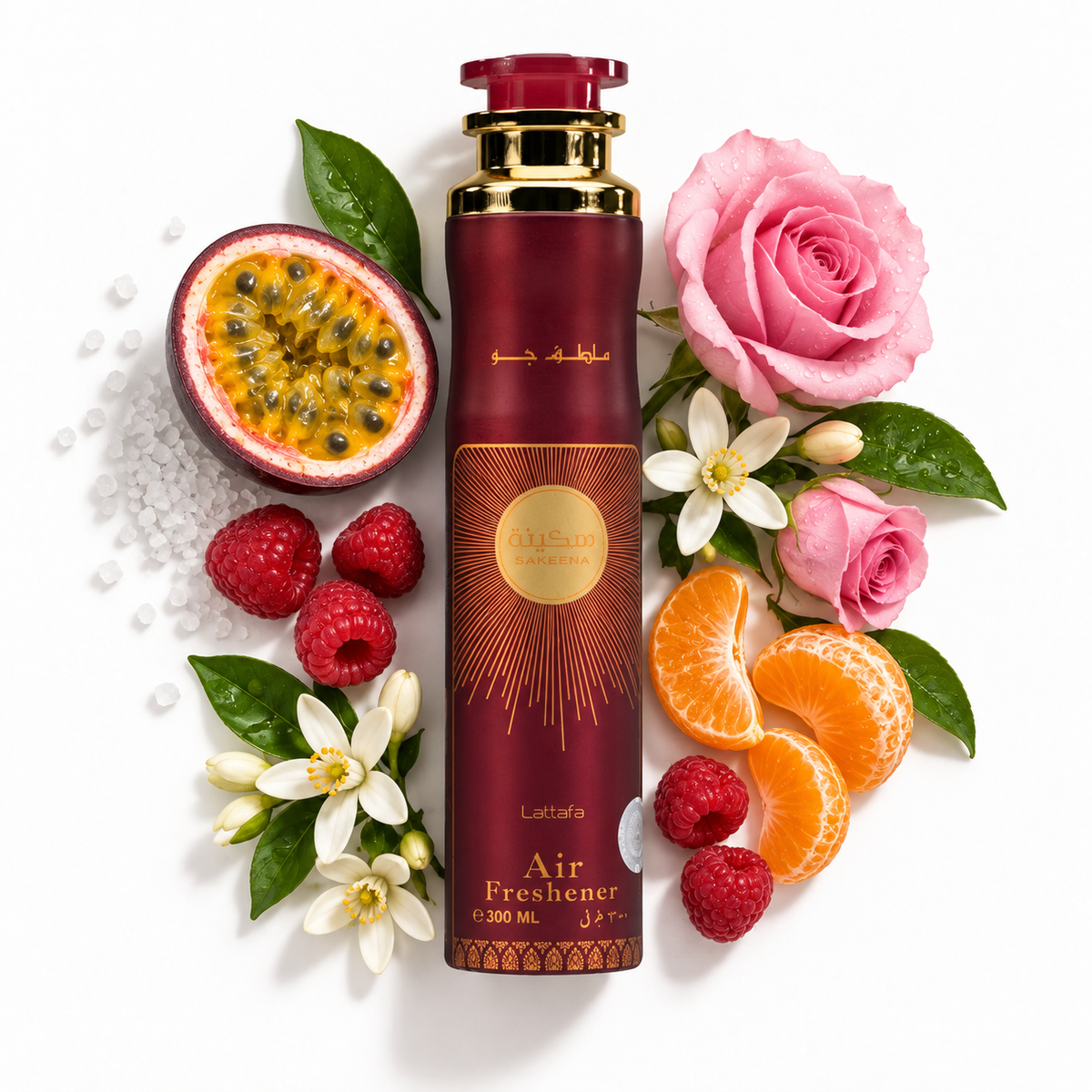 Lattafa Sakeena air freshener 300ml with passionfruit, mandarin, raspberry, rose, orange blossom and sea salt scent-note props on white