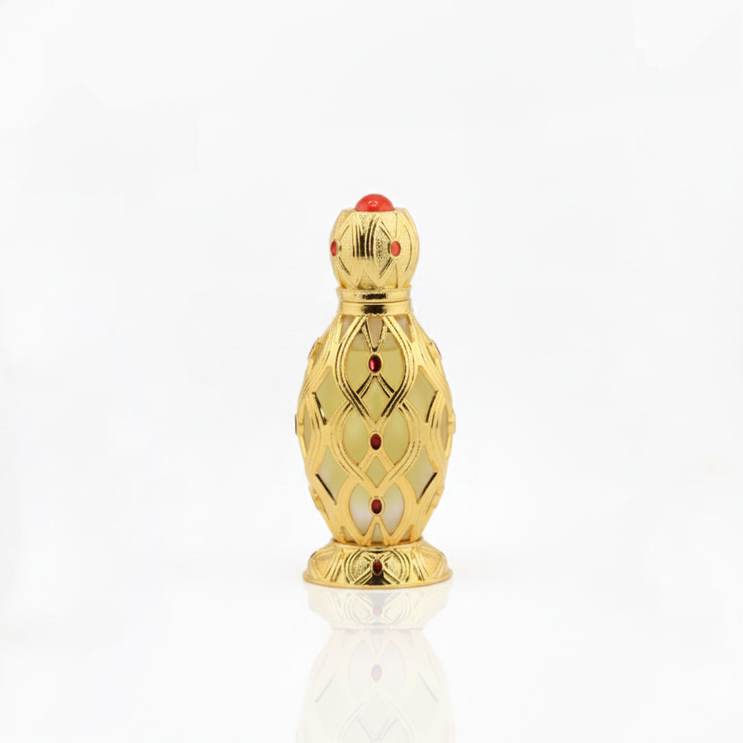 Gold and white decorative bottle with red accents on a white background