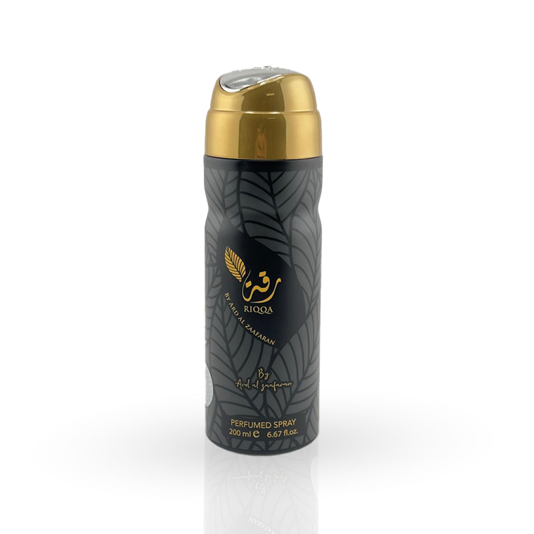 Perfumed spray bottle with gold cap on a white background